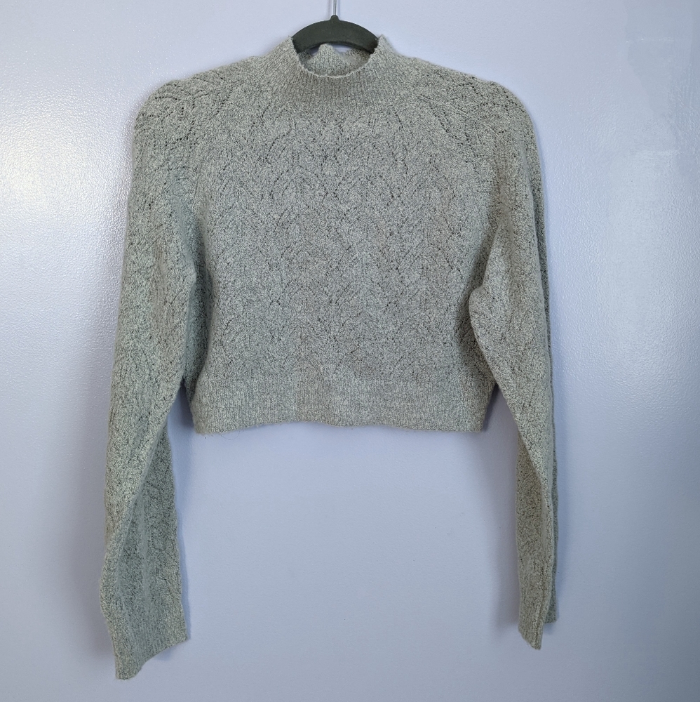 Delicate ash grey knit sweater